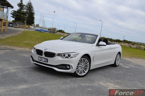2014 BMW 4 Series Convertible front quarter top down