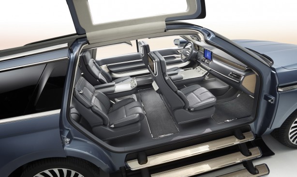 Access to the New Navigator Concept is provided through power gullwing doors and deployable concertina steps.