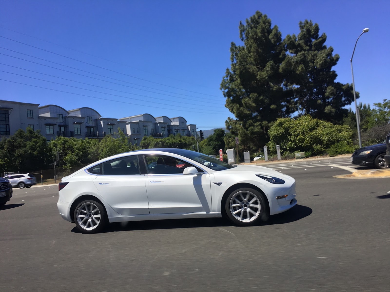 spied tesla model 3 caught without camo first time